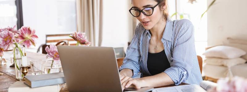 Women looking up information about pests on her laptop